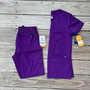 These have been worn twice, no longer NWT! Eggplant scrub set
